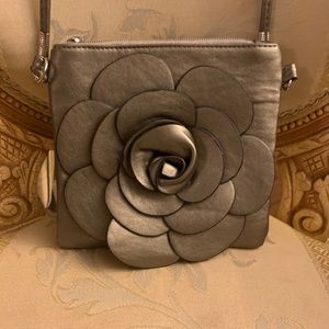 Crossbody blossom purse, pewter in colour.